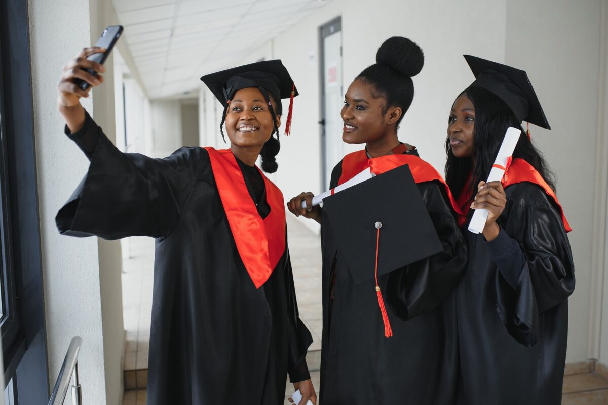 1600portrait multiracial graduates holding diploma 1