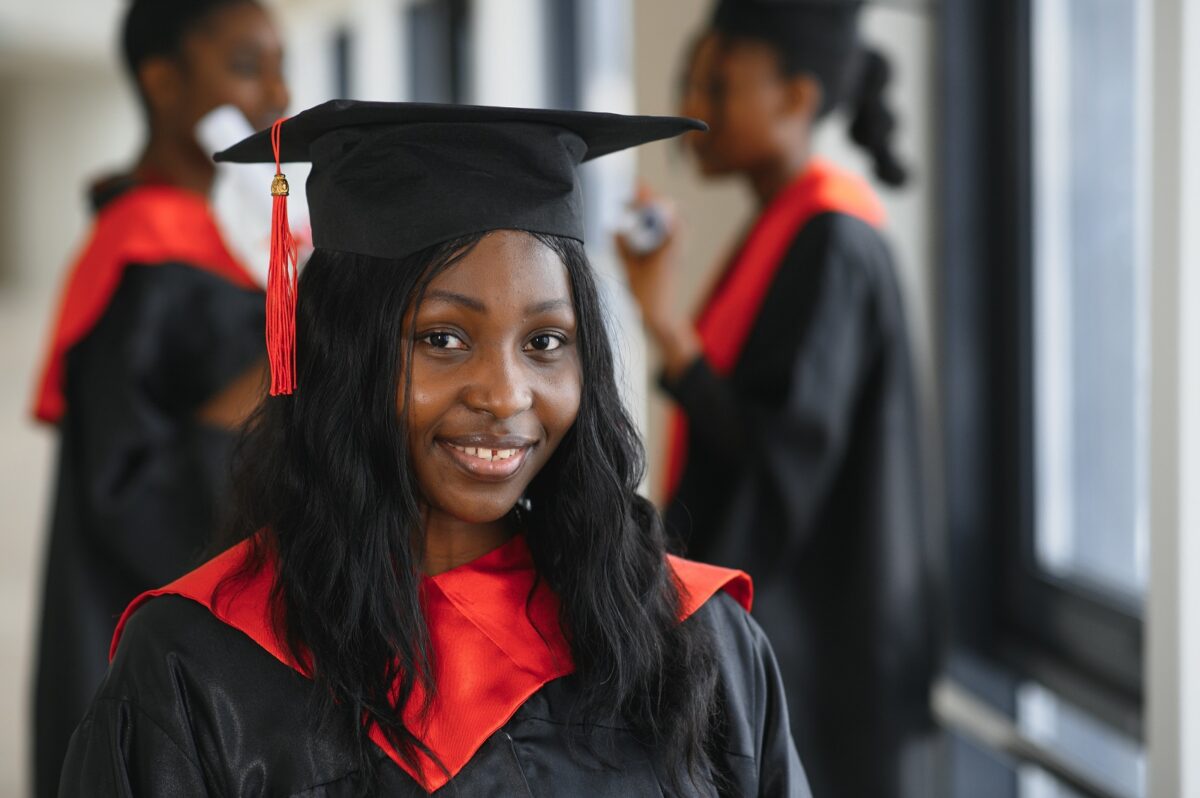 1600portrait multiracial graduates holding diploma