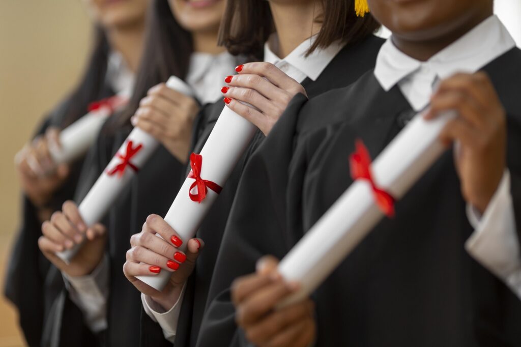 1600people graduating with diplomas close up